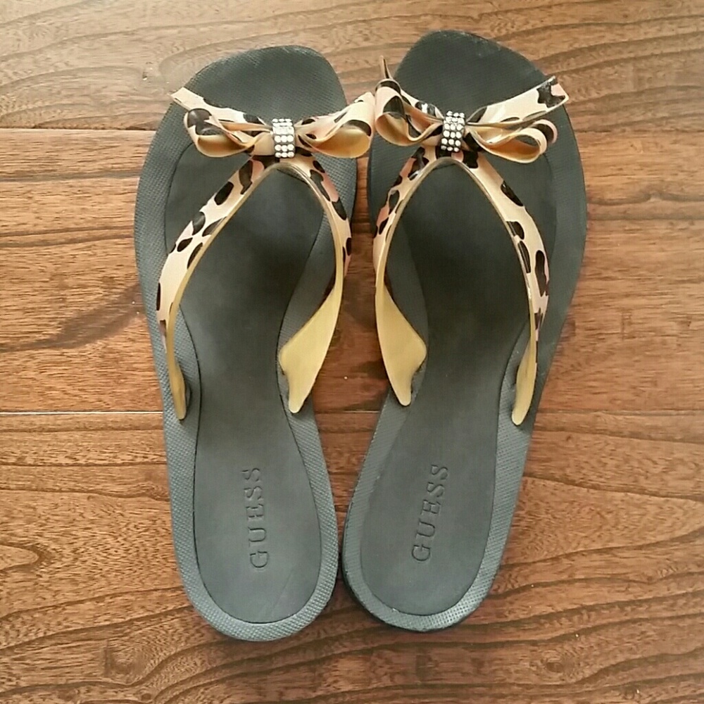 Leopard bow flip flops